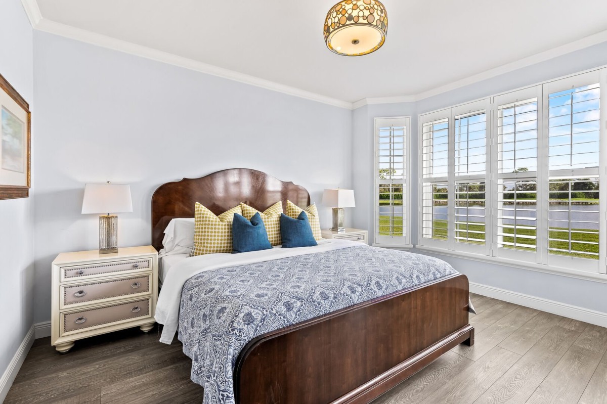 Master Bedroom with King Bed and Flat Screen TV; Private Entrance to Lanai Area; New Window Treatments!