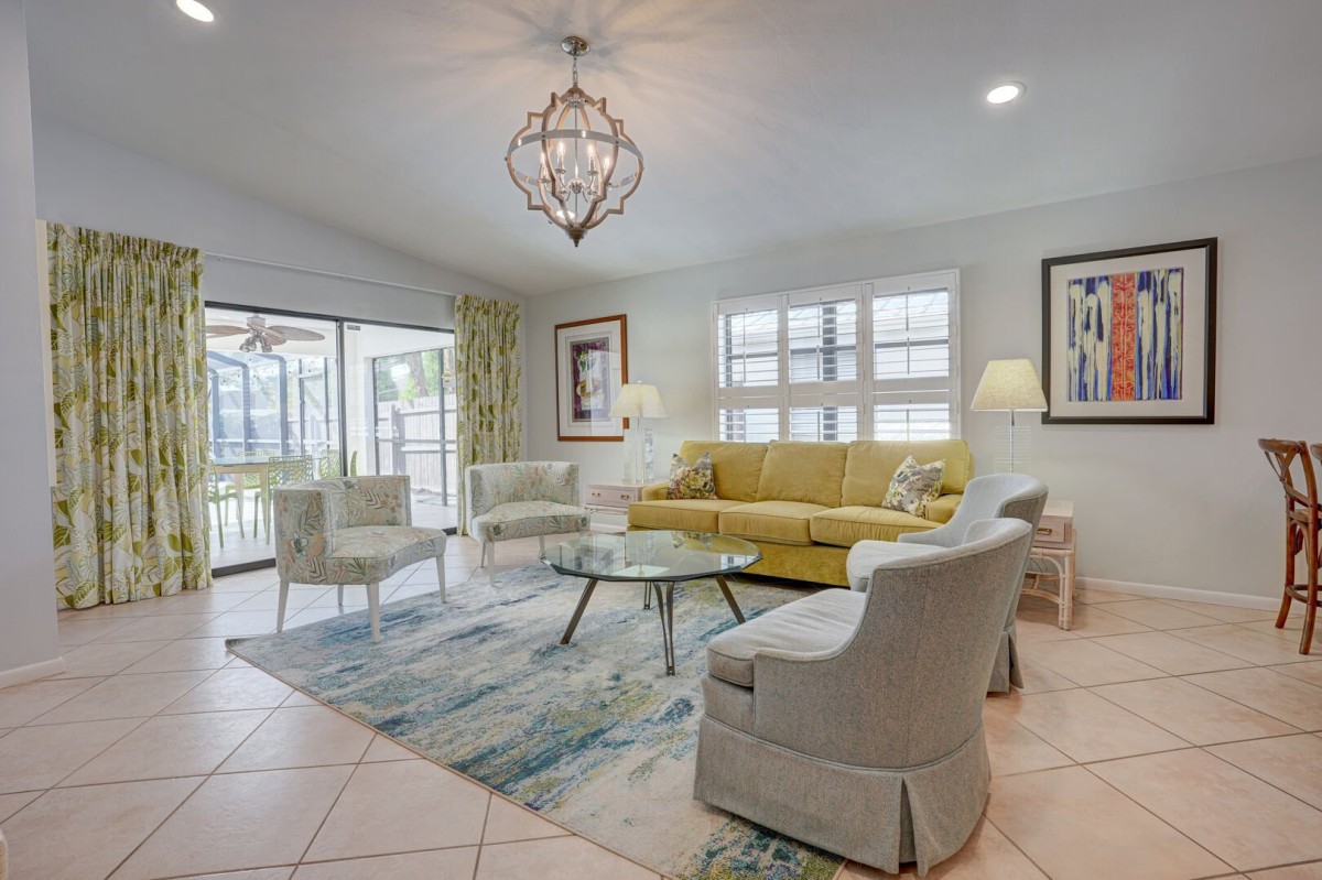 Living Room with access to Pool Area!