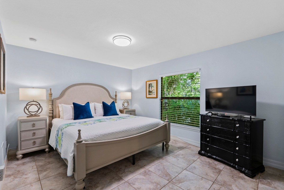 Master Bedroom with King Bed and Flat Screen TV;